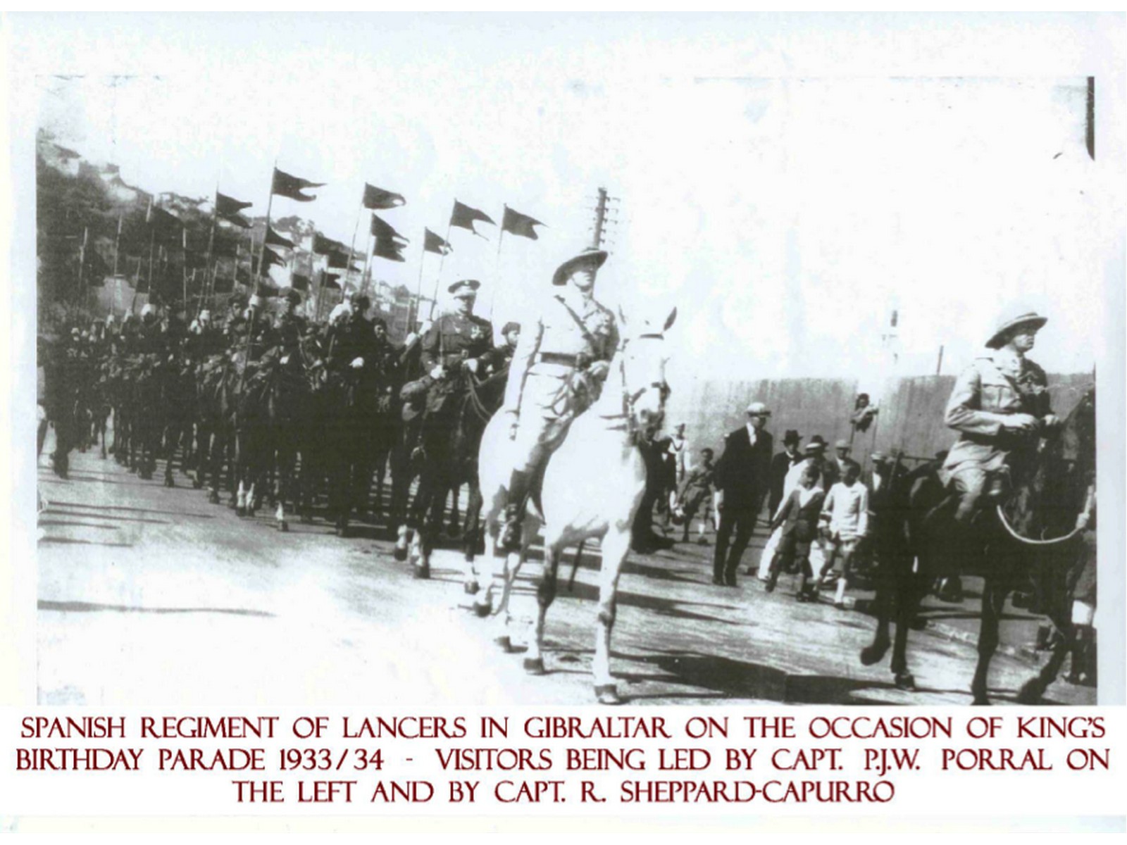 6.- Lanceros españoles precedidos por los oficiales gibraltareños Capitán Porral y Capitán Sheppard-Capurro vienen de honrar el cumpleaños de Jorge V (1933).jpg